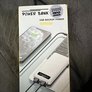 Brand new 20,000mAh high-capacity power bank.  Perfect for travel, emergencies,